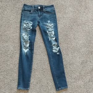 American eagle super stretched x dark blue jeans